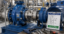 Professional industrial photo of a well-maintained pump with clean mechanical seals